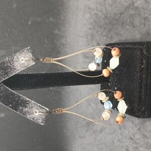 Brown tone teardrop shape beaded wire earrings
